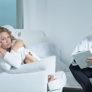 Young woman on a session with a psychiatrist